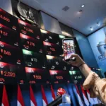 IHSG Melemah di Sesi I, Saham Pendatang Baru ‘COIN’ Justru Melesat dan Sentuh ARA