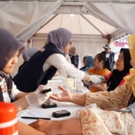 Semarak Merah Putih BRI Region 6 Hadirkan Pemeriksaan Kesehatan Gratis bagi Masyarakat Pasar Malaka Rorotan